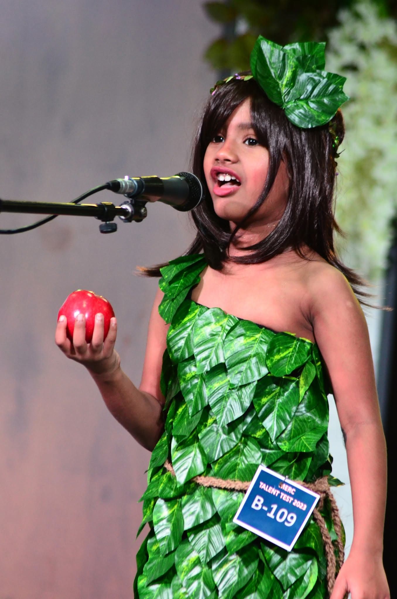 Child dressed as Eve for the Kids Church talent test